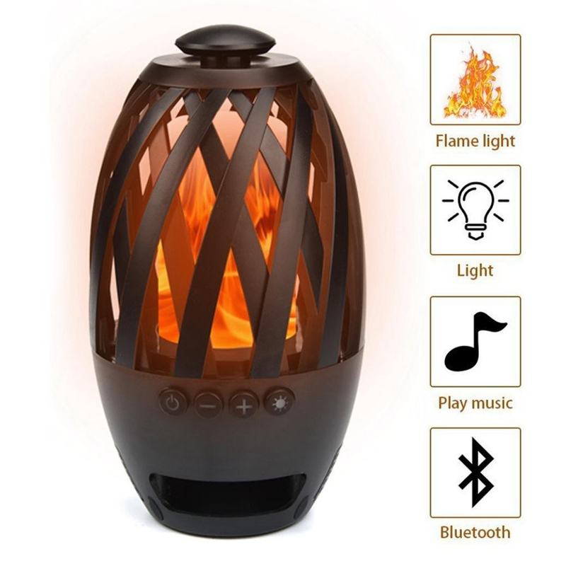 LED-lampa med brinnande flamma och Bluetooth högtalare